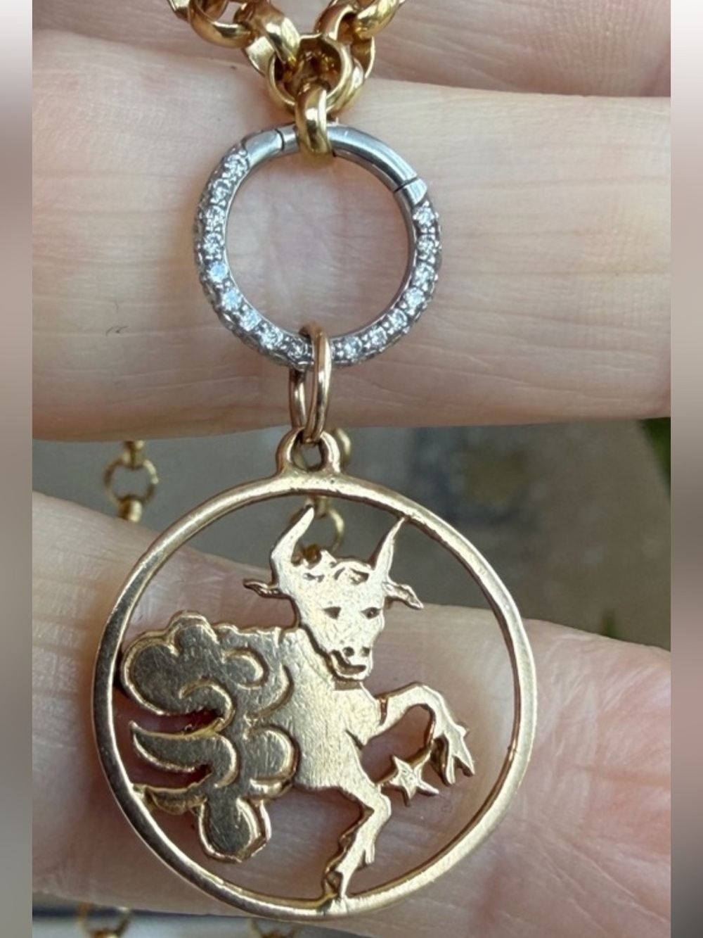 Platinum and diamond charm holder